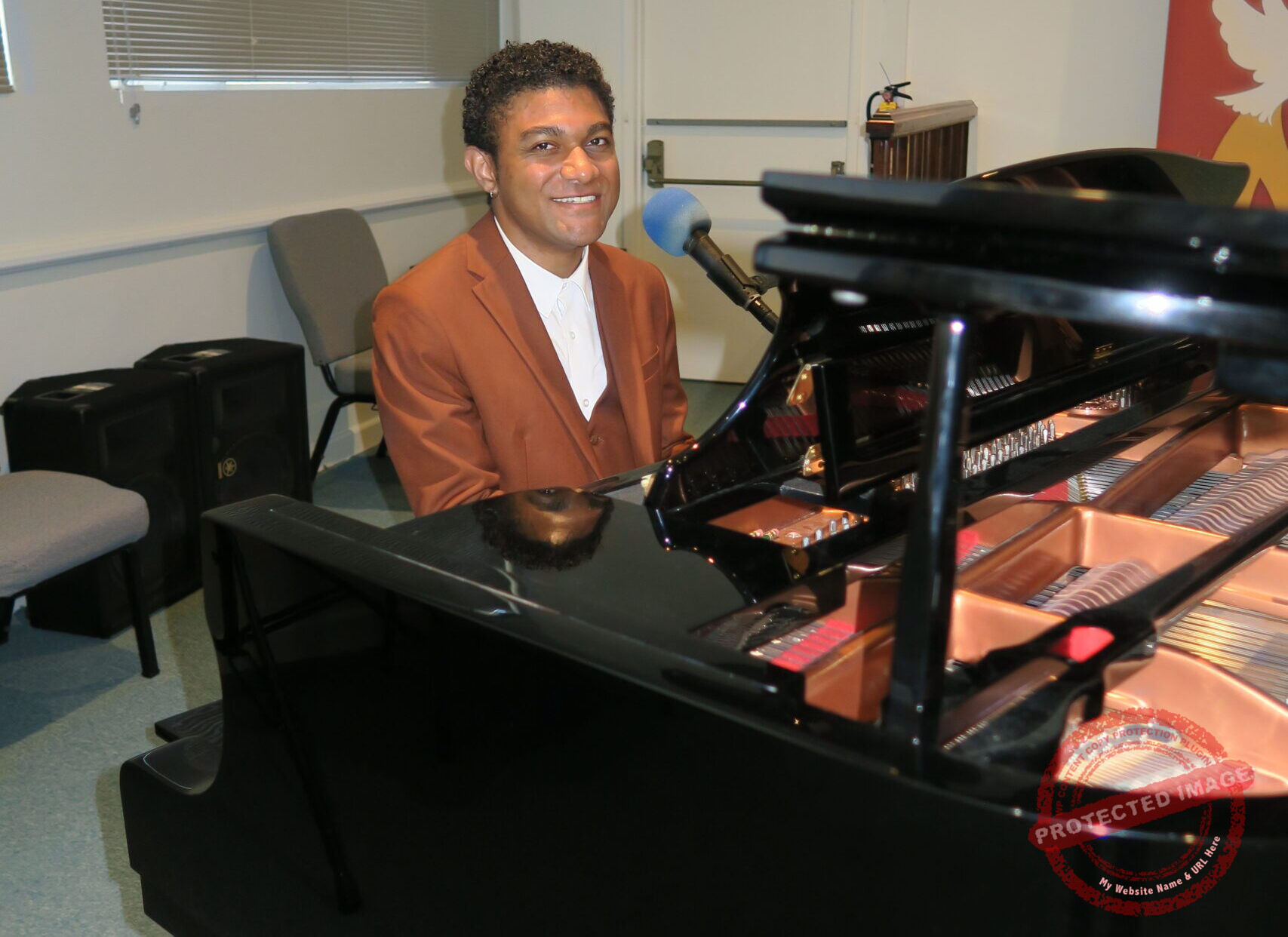 Worship facilitator at the piano