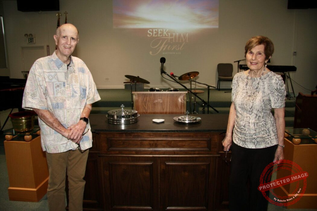 Man and woman sanctuary attendants
